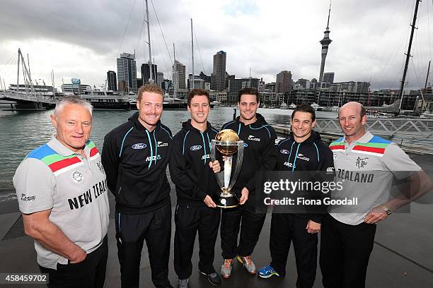 In front of the Auckland skyline are 1992 Black Cap Gavin Larsen, current Black Caps Martin Guptill, Matt Henry, Mitchell McClenaghan and Nathan...