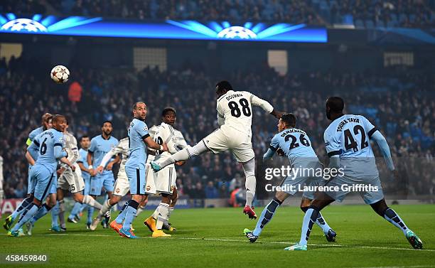 Seydou Doumbia of CSKA Moscow scores the opening goal during the UEFA Champions League Group E match between Manchester City and CSKA Moscow on...