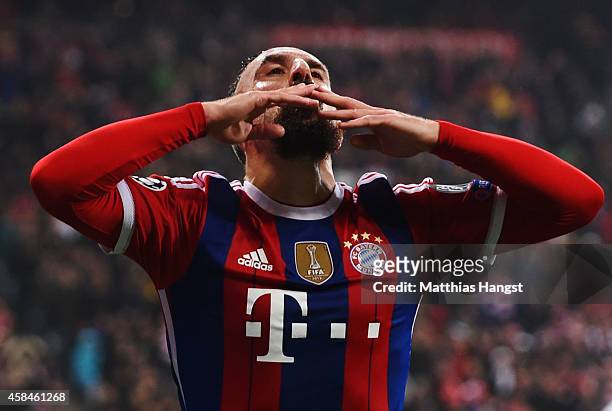 Franck Ribery of Bayern Muenchen celebrates as he scores their first goal during the UEFA Champions League Group E match between FC Bayern Munchen...