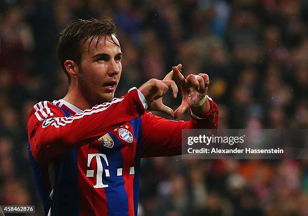 Mario Goetze of Bayern Muenchen celebrates as he scores their second goal during the UEFA Champions League Group E match between FC Bayern Munchen...