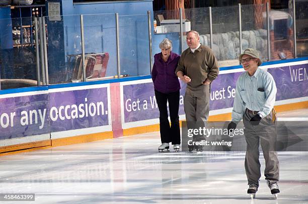 seniors skating ... west edmonton mall - west-mall-rink stock pictures, royalty-free photos & images