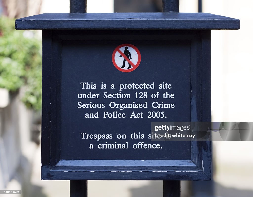No Trespassing sign on Buckingham Palace gate