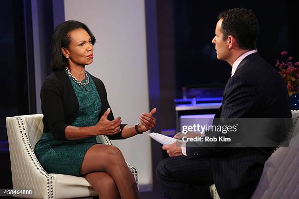 Condoleezza Rice is interviewed by host Brian Kilmeade during a taping of "FOX And Friends" at FOX Studios on November 5, 2014 in New York City.