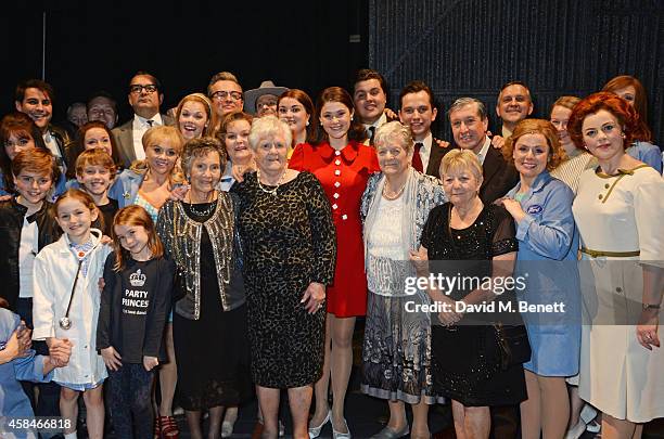 Cast member Gemma Arterton poses with the ladies of the "Made In Dagenham" company and real-life Dagenham strikers Gwen Davis, Eileen Pullen, Vera...