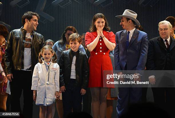 Cast members Adrian der Gregorian, Annie Guy, Tommy Rodger, Gemma Arterton, Steve Furst and Ian Jervis bow at the curtain call during the press night...