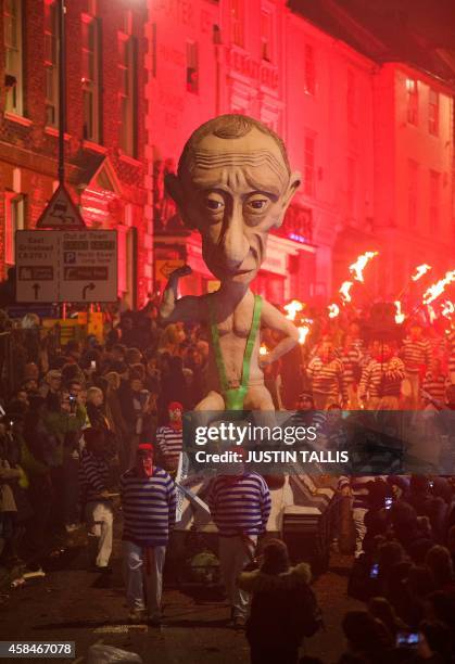 An effigy of Russian President Vladimir Putin is paraded through the streets of Lewes in Sussex, on November 5 during the traditional Bonfire Night...