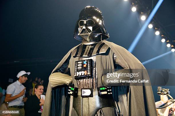 Darth Vader costume greets the crowd at the Triton fashion show during Sao Paulo Fashion Week Winter 2015 at Parque Candido Portinari on November 5,...