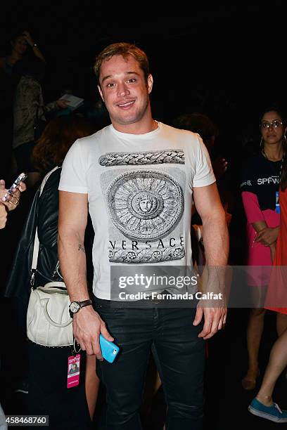 Helinho Calfat attends the Triton fashion show during Sao Paulo Fashion Week Winter 2015 at Parque Candido Portinari on November 5, 2014 in Sao...