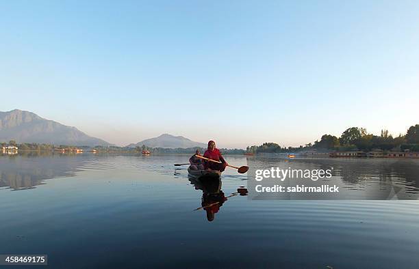 muslim women boating in dal lake, india - dal lake stock pictures, royalty-free photos & images