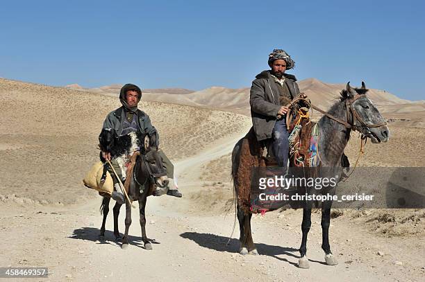 afghan riders - bamiyan buddhas stock pictures, royalty-free photos & images