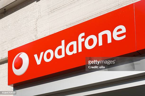 vodafone sign - vodafone stock pictures, royalty-free photos & images
