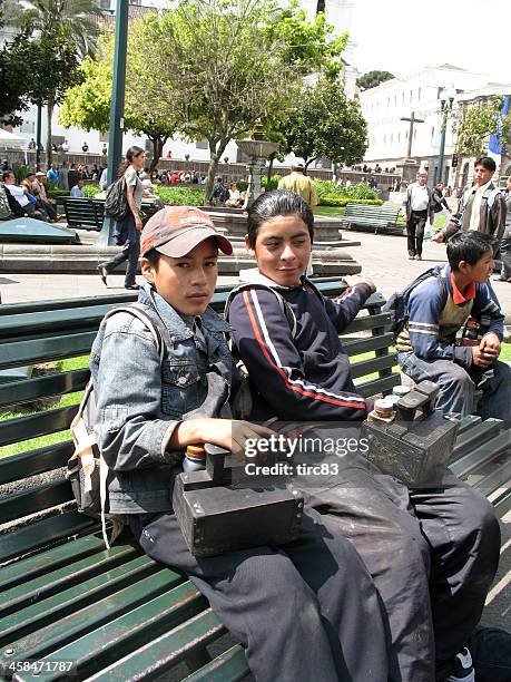 shoeshine boys sitting on a bench - shoeshiner stock pictures, royalty-free photos & images