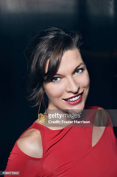 Milla Jovovich poses for a portrait at the amfAR LA Inspiration Gala on October 29, 2014 in Los Angeles, California.