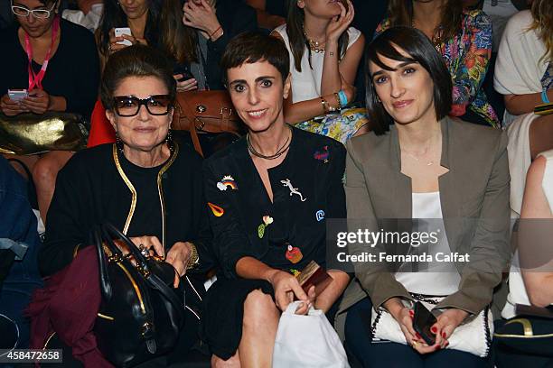 Costanza Pascolato, left, Lilian Pacce and Maria Prata attend the Triton fashion show during Sao Paulo Fashion Week Winter 2015 at Parque Candido...