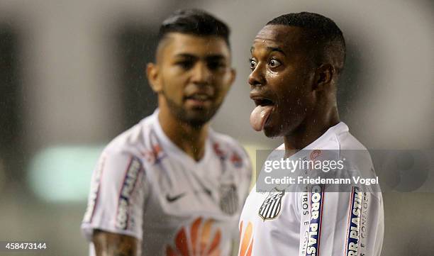 Robinho of Santos celebrates scoring the first goal during the match between Santos and Cruzeiro for Copa do Brasil 2014 at Vila Belmiro Stadium on...