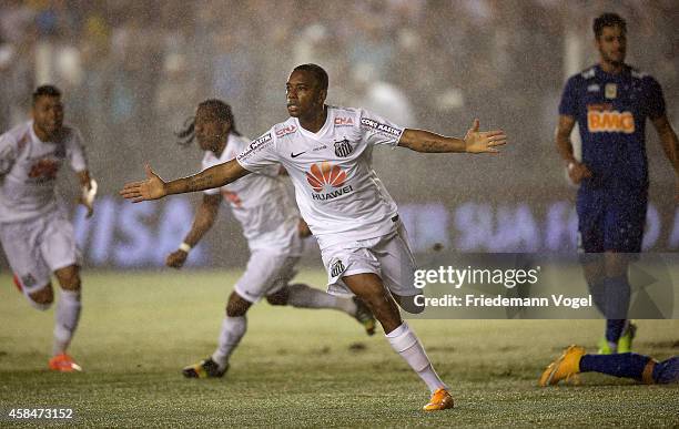 Robinho of Santos celebrates scoring the first goal during the match between Santos and Cruzeiro for Copa do Brasil 2014 at Vila Belmiro Stadium on...