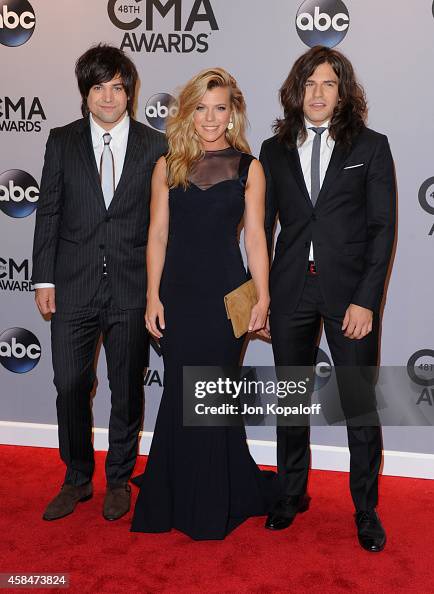 Nester Perry Neil Perry, Kimberly Perry, and Reid Perry of The Band Perry attend ...