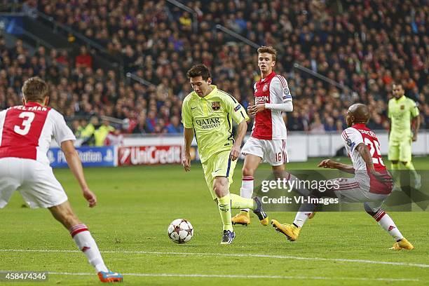 Joel Veltman of Ajax, Lionel Messi of FC Barcelona, Lucas Andersen of Ajax, Thulani Serero of Ajax during the UEFA Champions League group f match...