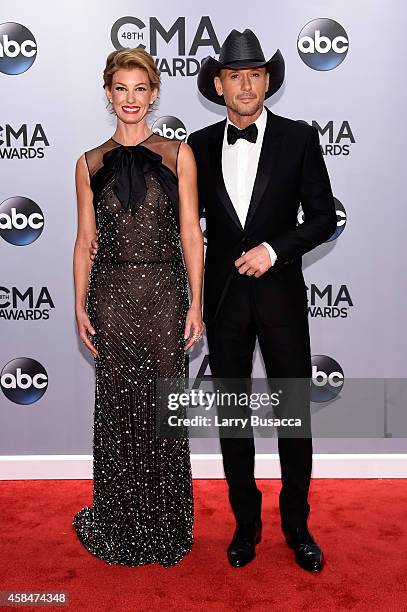 Faith Hill and Tim McGraw attend the 48th annual CMA Awards at the Bridgestone Arena on November 5, 2014 in Nashville, Tennessee.