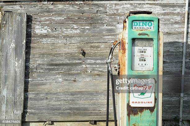 old sinclair gas pump and weathered farm building - run down gas station stock pictures, royalty-free photos & images