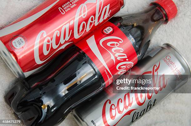 three type of coca cola cans and bottle - fanta stock pictures, royalty-free photos & images
