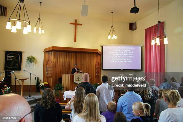christian reformed church sunday service - congregation stock pictures, royalty-free photos & images