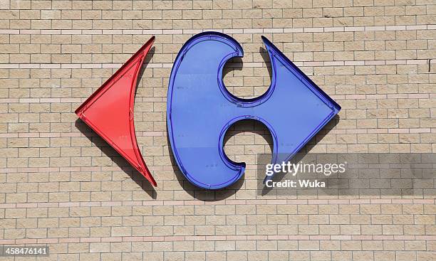 logotipo de carrefour almacenar - encrucijada en el camino fotografías e imágenes de stock