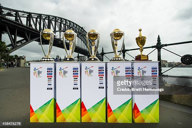 The ICC Cricket World Cup Trophies are pictured during the ICC 2015 Cricket World Cup 100 days to go announcement on November 6, 2014 in Sydney,...