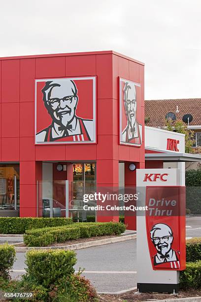 kfc (kentucky fried chicken) store - kentucky fried chicken bucket stock pictures, royalty-free photos & images