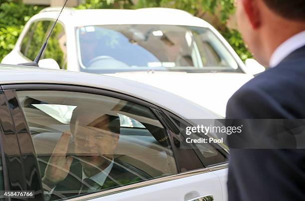 Prime Minister of the Netherlands Mark Rutte waves towards Australia's Prime Minister Tony Abbott as he arrives at Parliament House on November 6,...