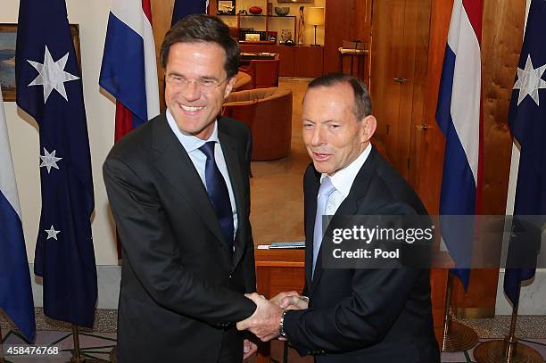 Prime Minister of the Netherlands Mark Rutte is greeted by Australia's Prime Minister Tony Abbott at Parliament House on November 6, 2014 in...