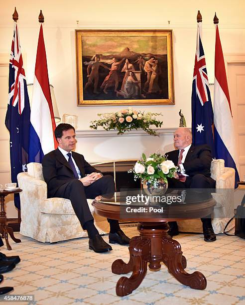The Netherlands Prime Minister Mark Rutte sits for talks with Australian Governor-General Peter Cosgrove at Government House in on November 6, 2014...