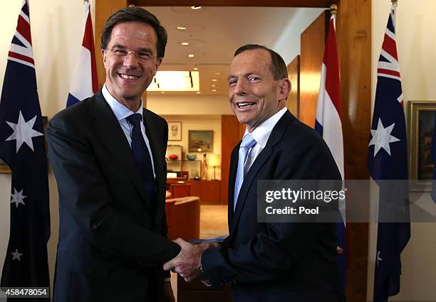 Prime Minister of the Netherlands Mark Rutte is greeted by Australia's Prime Minister Tony Abbott at Parliament House on November 6, 2014 in...