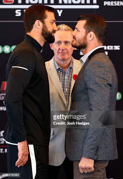 Opponents Luke Rockhold of the United States and Michael Bisping of England face off during the UFC Fight Night press conference at the Opera Point...
