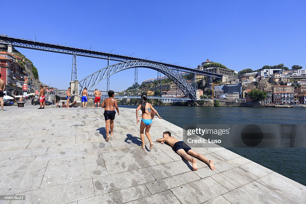 Diving and sunbathing in Douro, Oporto (Portugal)