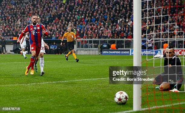 Franck Ribery of Bayern Muenchen scores his team's first goal during the UEFA Champions League Group E match between FC Bayern Munchen and AS Roma at...