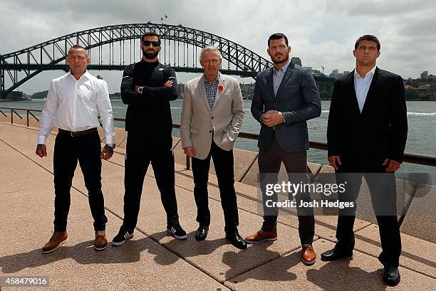 Lightweight Ross Pearson of England, middleweight Luke Rockhold of the United States, UFC Managing Director Tom Wright, middleweight Michael Bisping...