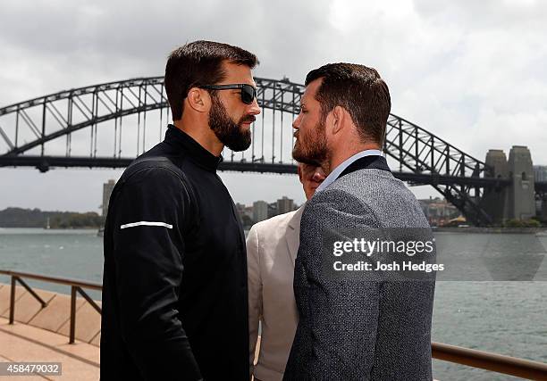 Opponents Luke Rockhold of the United States and Michael Bisping of England face off in front of the Sydney Harbour Bridge during the UFC Fight Night...