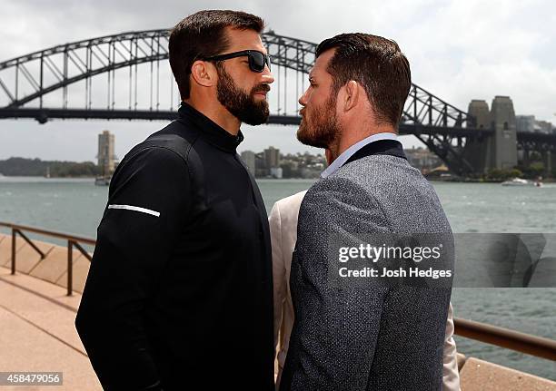 Opponents Luke Rockhold of the United States and Michael Bisping of England face off in front of the Sydney Harbour Bridge during the UFC Fight Night...