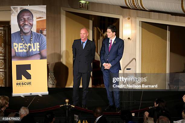 Recording artist Sting and IRC President and CEO David Miliband honor the humanitarian aid workers around the world at the Annual Freedom Award...