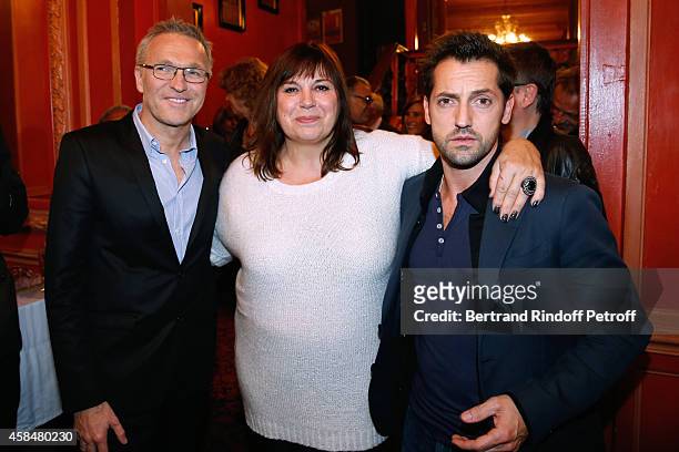 Autor of the piece Laurent Ruquier, actors of the piece Michele Bernier and Frederic Diefenthal pose after attend the 150th Representation of the 'Je...