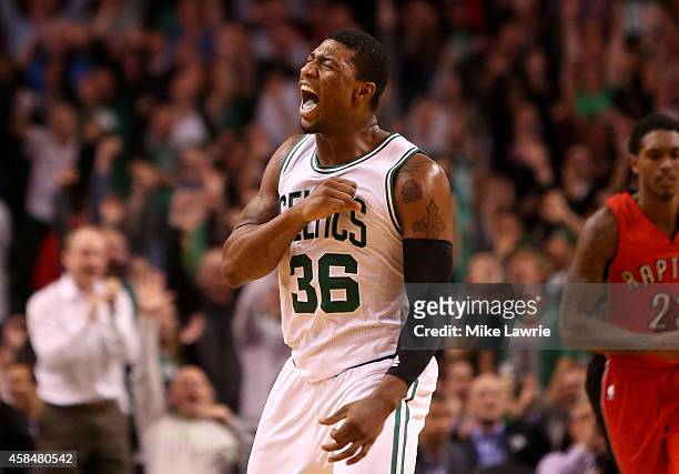Marcus Smart of the Boston Celtics reacts after a three point basket late in the second half against the Toronto Raptors at TD Garden on November 5,...
