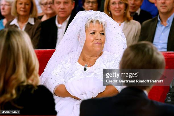 Actress Mimie Mathy presents her Show "Je papote avec vous" dressed in a wedding dress during the 'Vivement Dimanche' French TV Show at Pavillon...