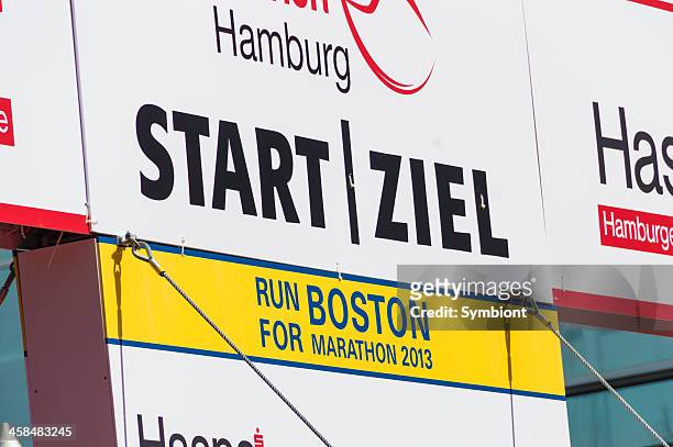 &quot;run for boston marathon 2013&quot; in hamburg, germany - boston marathon finish stock pictures, royalty-free photos & images