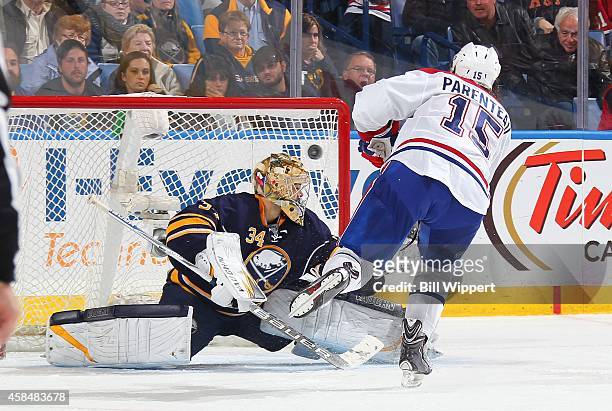 Parenteau of the Montreal Canadiens scores the game winning shootout goal against Michal Neuvirth of the Buffalo Sabres on November 5, 2014 at the...