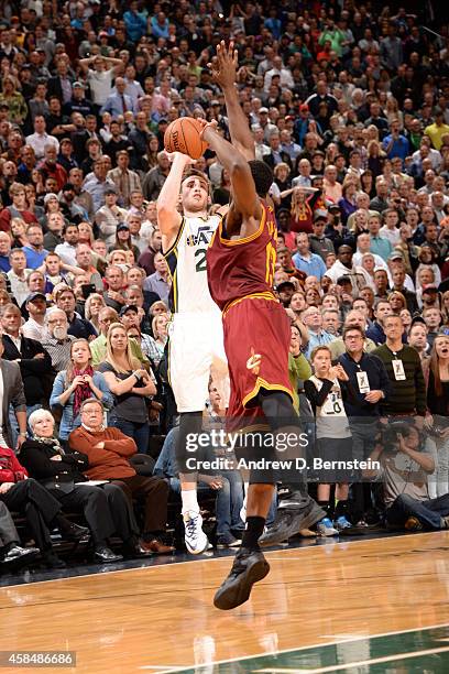 Gordon Hayward of the Utah Jazz hits the game winning shot against the Cleveland Cavaliers at EnergySolutions Arena on November 5, 2014 in Salt Lake...