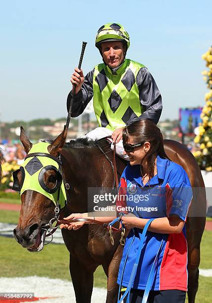 Damien Oliver returns to scale on Vain Queen, after winning race six, the G.H Mumm Stakes on Crown Oaks Day at Flemington Racecourse on November 6,...