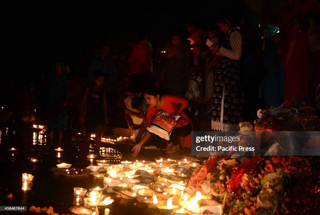 Devotee lit oil lamps at Baluwaghat at the bank of River...