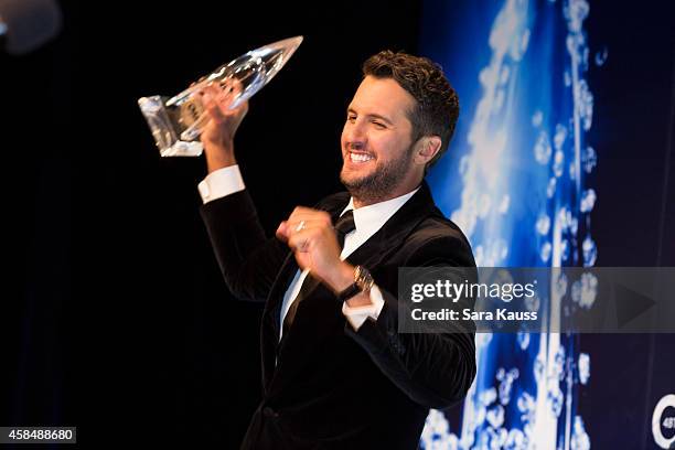 Luke Bryan wins Entertainer of the Year at the 48th annual CMA Awards at the Bridgestone Arena on November 5, 2014 in Nashville, Tennessee.
