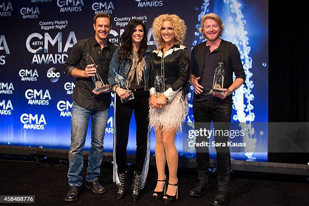 Jimi Westbrook, Karen Fairchild, Kimberly Schlapman and Phillip Sweet of Little Big Town win Vocal Group of the Year at the 48th annual CMA Awards at...